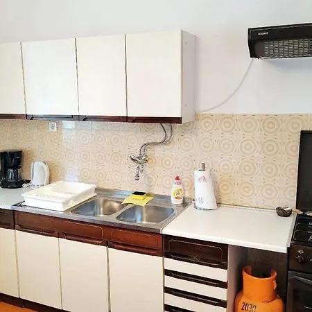 Апартаменты Family Friendly Seaside Barbat, Rab - 22360